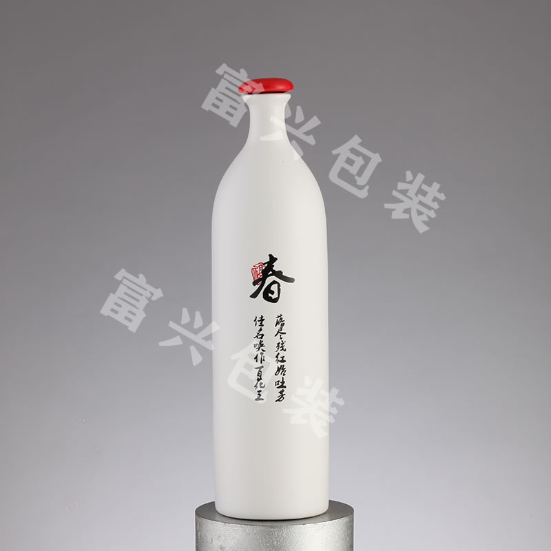 圆柱形双龙酒瓶 喷涂烤花玻璃酒 500ml白酒瓶  富兴酒类包装