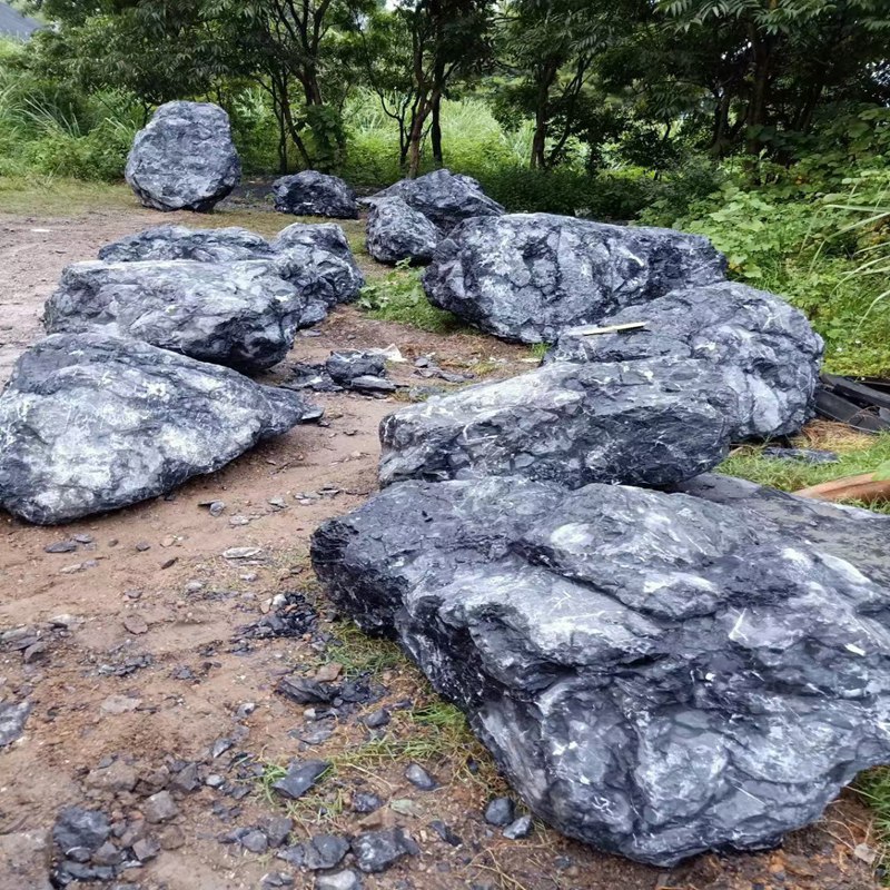 万吨黑山石景石设计施工 黑石头黑色石头  枯山水景观石