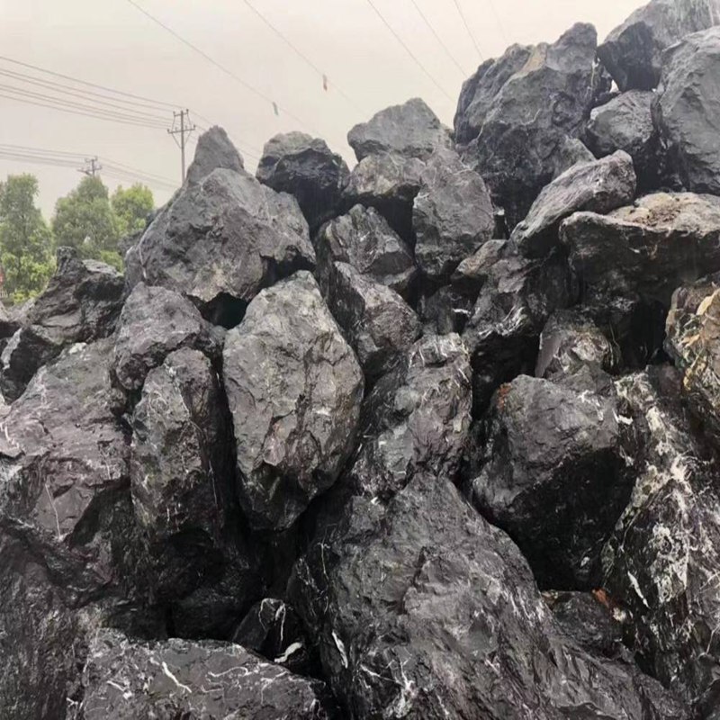 磬航万吨黑山石千层石产地批发 黑石头龟纹石 枯山水景观石 假山工程