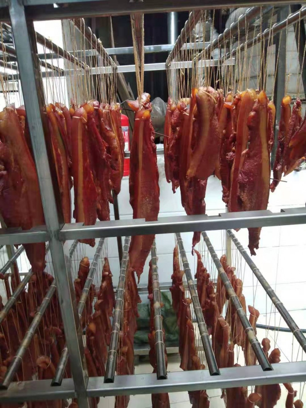 内蒙古赤峰腊肉烟熏炉价格   哈红肠一体机哪家好  鹌鹑蛋烟熏炉厂家