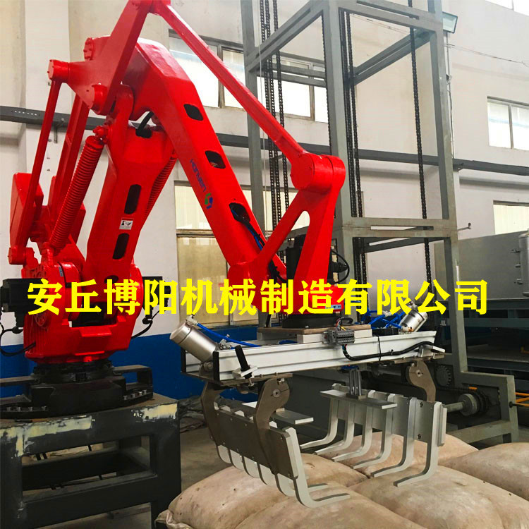 青岛码垛机械手_自动码袋设备_碳酸钙全自动包装码垛生产线视频