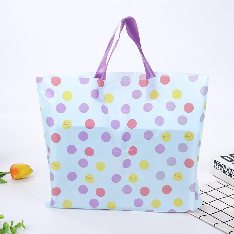 厂家定做服装店宸鑫手提购物袋、包装塑料袋 化妆品手提平口购物袋logo定制印刷