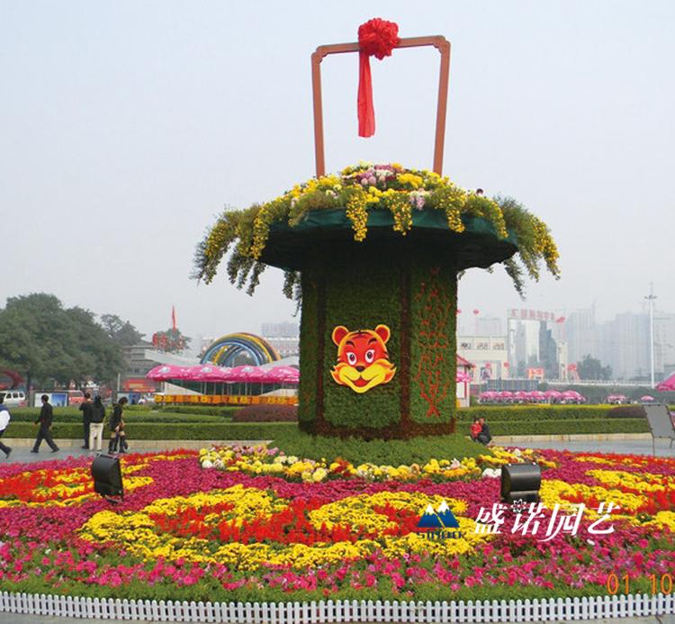 五一五色草造型设计 济南劳动节鲜花绿雕 欢迎致电山东盛诺 艺动物景观绿雕制作 