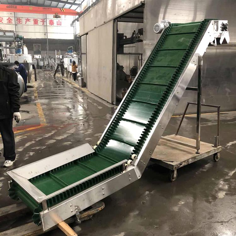 食品输送机速冻饺子爬坡挡板提升机304白钢密封皮带格挡上料机定制价格美丽