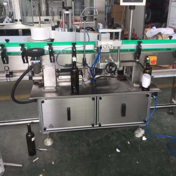 全自动不干胶贴标机  葡萄酒瓶贴标机   白酒瓶贴标机 远科贴标机  质量保障