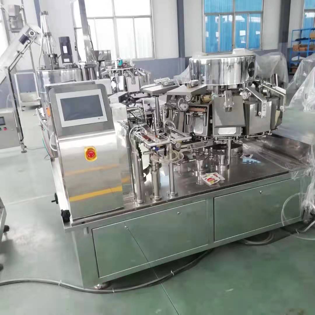 宠物食品全自动给带式真空包装机