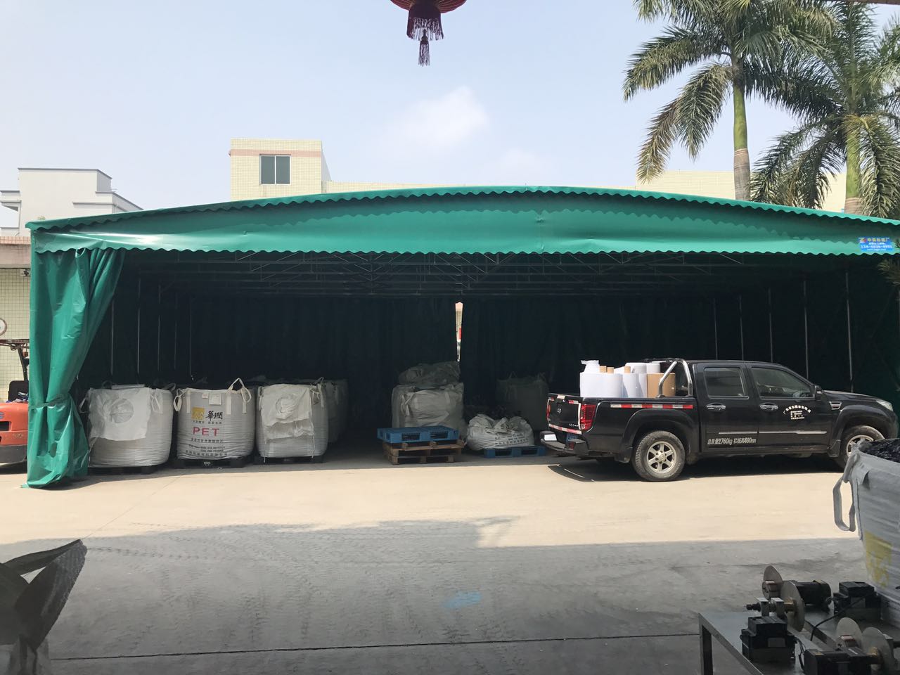 山东博兴定制电动推拉蓬腾空伸缩雨篷徐州移动仓库棚工厂装卸货运站遮阳棚