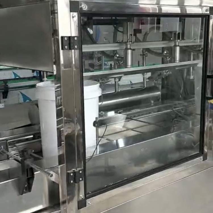 九巧酒精灌装机  四头灌装机价  适应于多种瓶型，活塞式定量原理