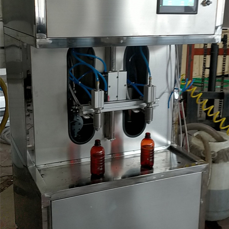 半自动小剂量灌装机  小瓶口服液灌装机  可用于各类异型瓶装