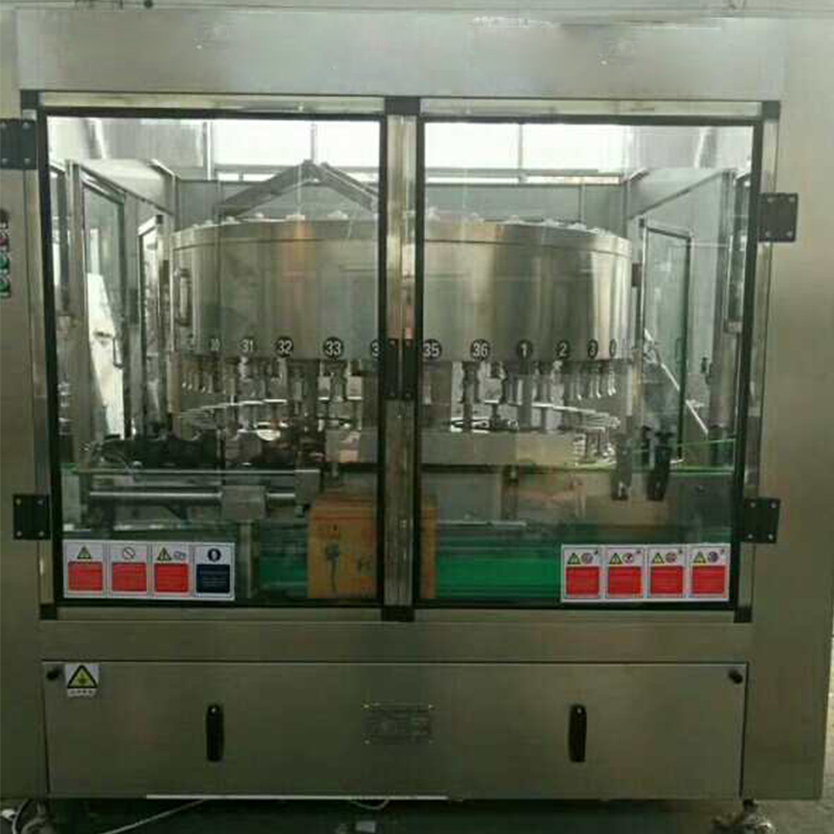 提拉阀白酒罐装机出售 灌装机订制定做 白酒灌装机供应