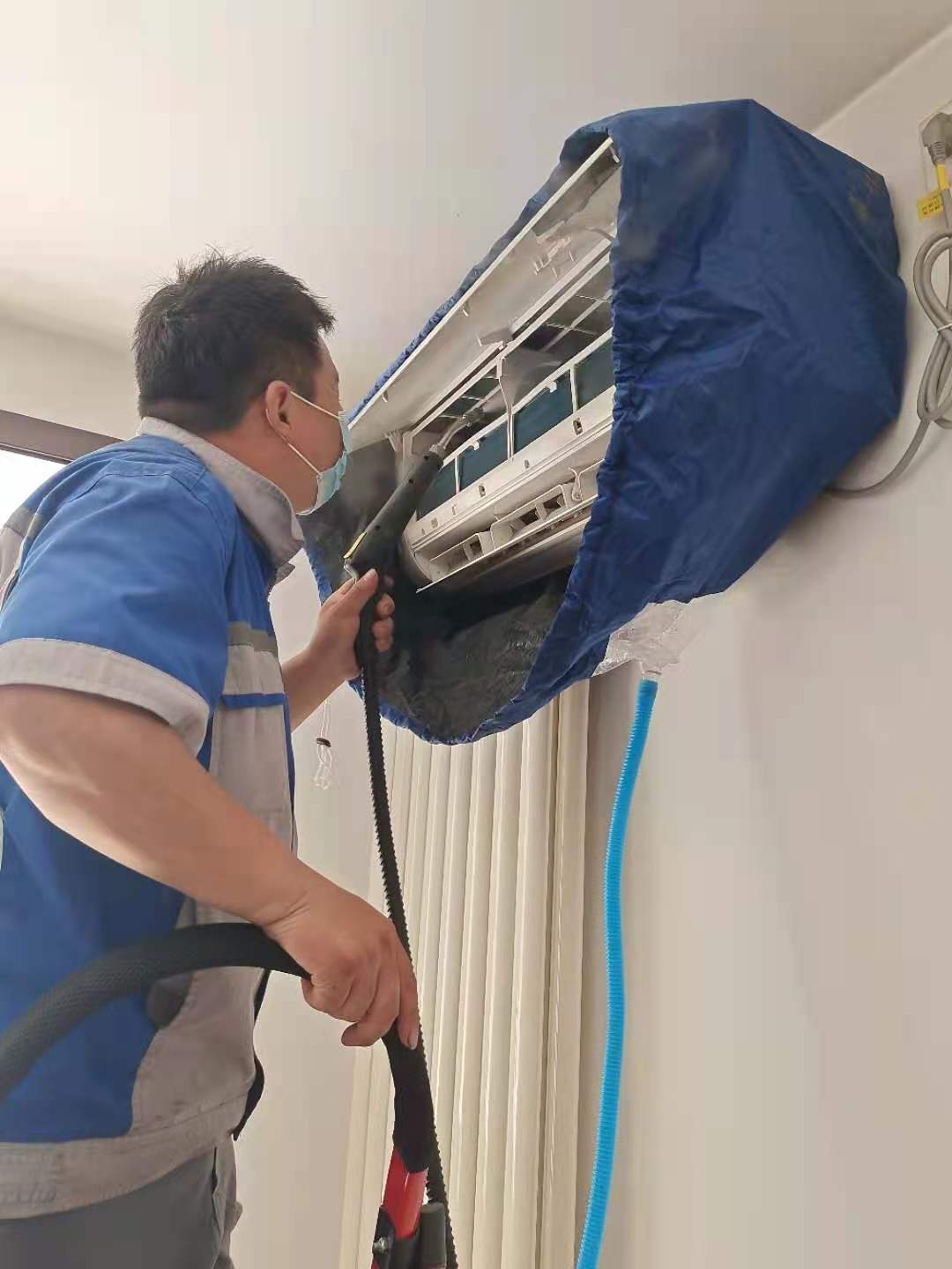 北京空调清洗服务 专业上门清洗空调 