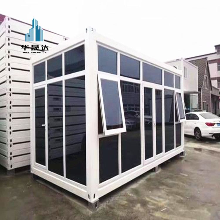 安徽防潮防腐住人打包箱房 橘皮纹岩棉夹芯板打包式箱房 内置空调热水器夏季打包厢