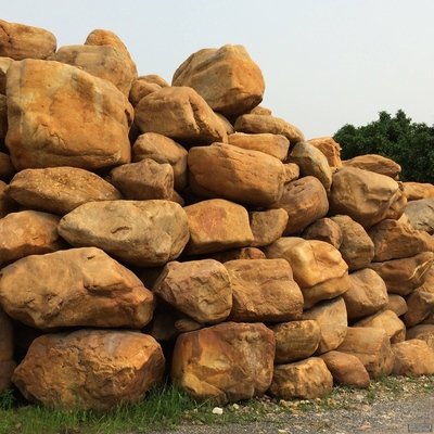 大批量出售 万吨黄蜡石千层石龟纹石产地批发  黄蜡石批发价格