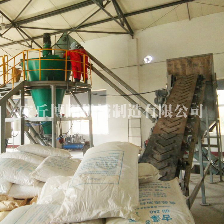 颗粒自动破包机   自动破袋输送生产线    自动拆料设备流程