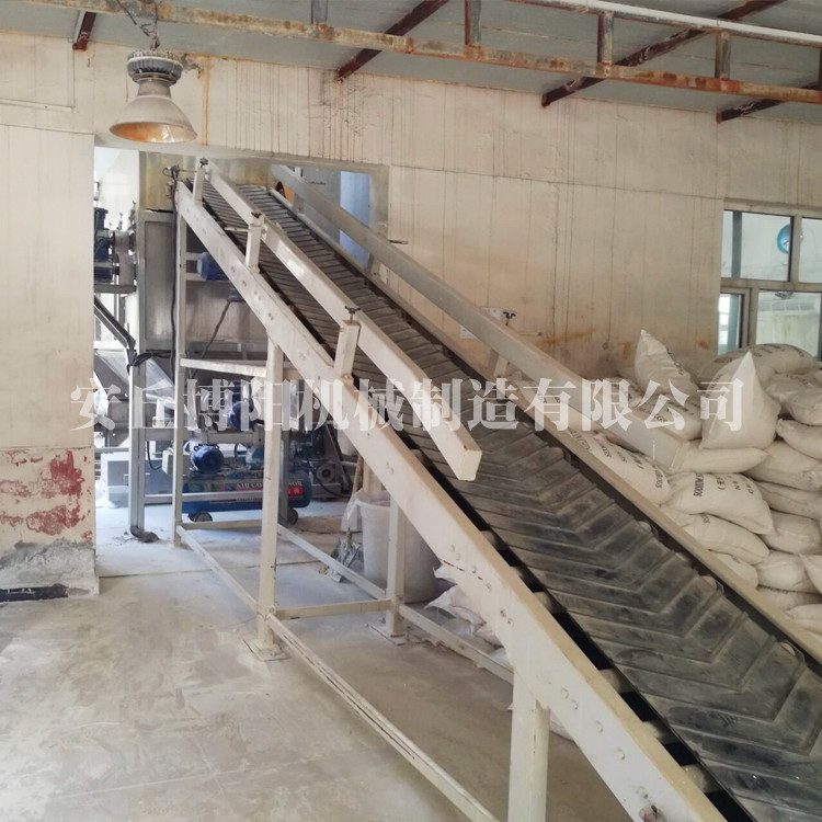 河北粉体颗粒全自动拆包机    自动破包卸料机工作现场   自动破包投料站应用