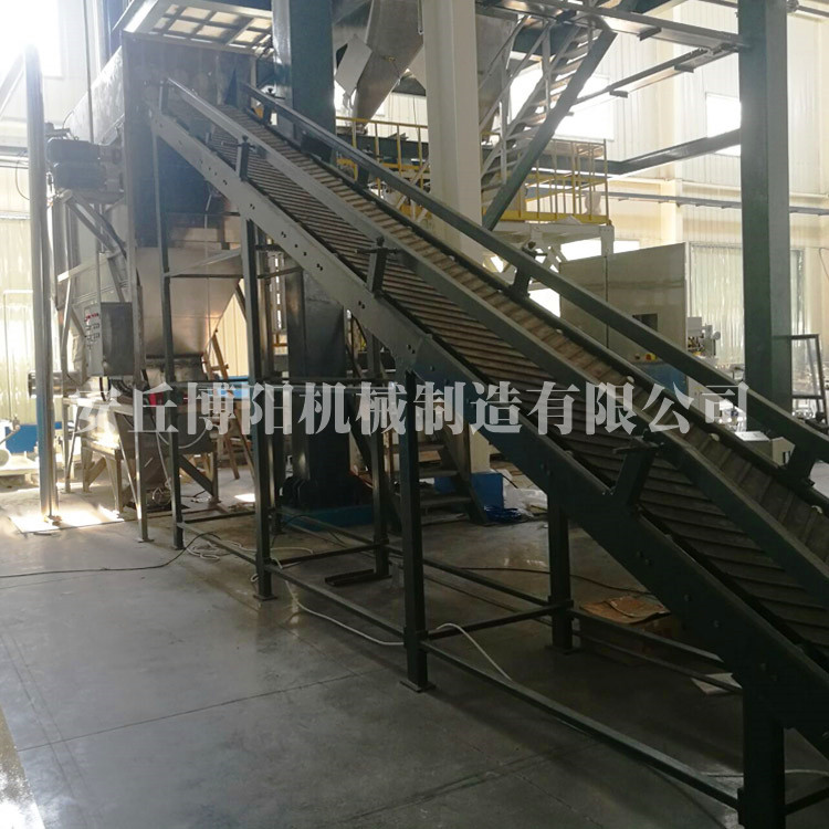 西藏硼砂自动破包机厂家     非标定制自动拆袋输送机  设计自动拆袋投料站