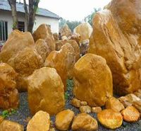 万吨黄蜡石,黄石头产地批发，黄色卵石 黄皮石，黄色假山石，假山石鹅卵石