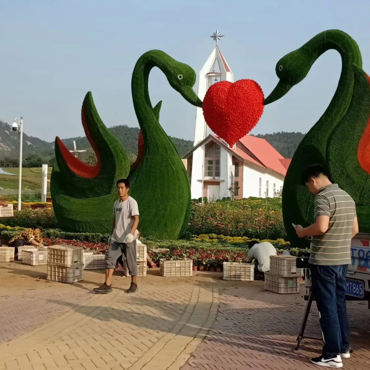 花卉绿雕设计 活动景观绿雕生产厂家  大小图案可定制