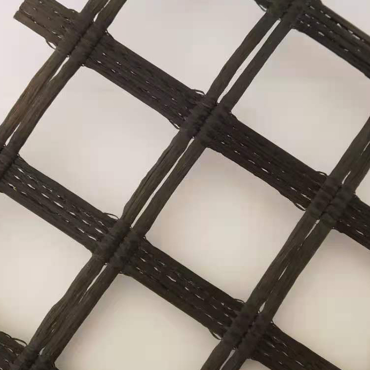 阳光新材料厂家批发路面增强养护用 PET35-20KN三经二纬单向经编涤纶土工格栅