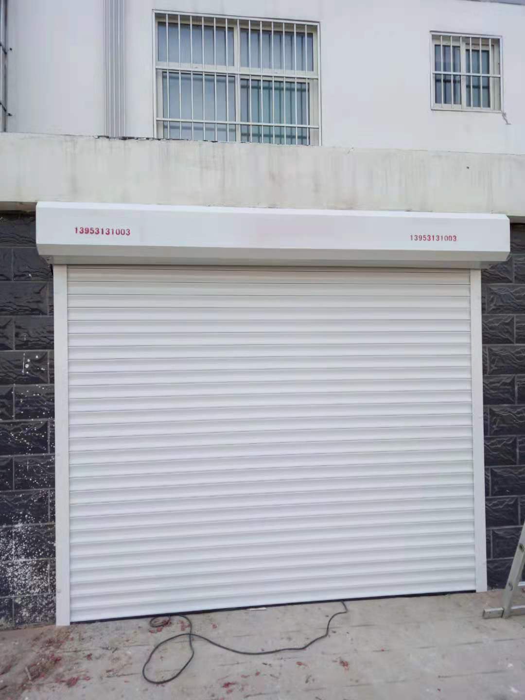 济南 铝合金卷帘门厂家 保温发泡卷帘门价格  遥控车库门 翻版车库门 制作厂家 配备各种卷帘门遥控器