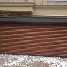 济南高薪车库门价格 别墅遥控翻版门  配备各种车库门遥控器 电动车库门厂家
